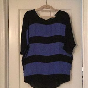 Flowing blue and black top.